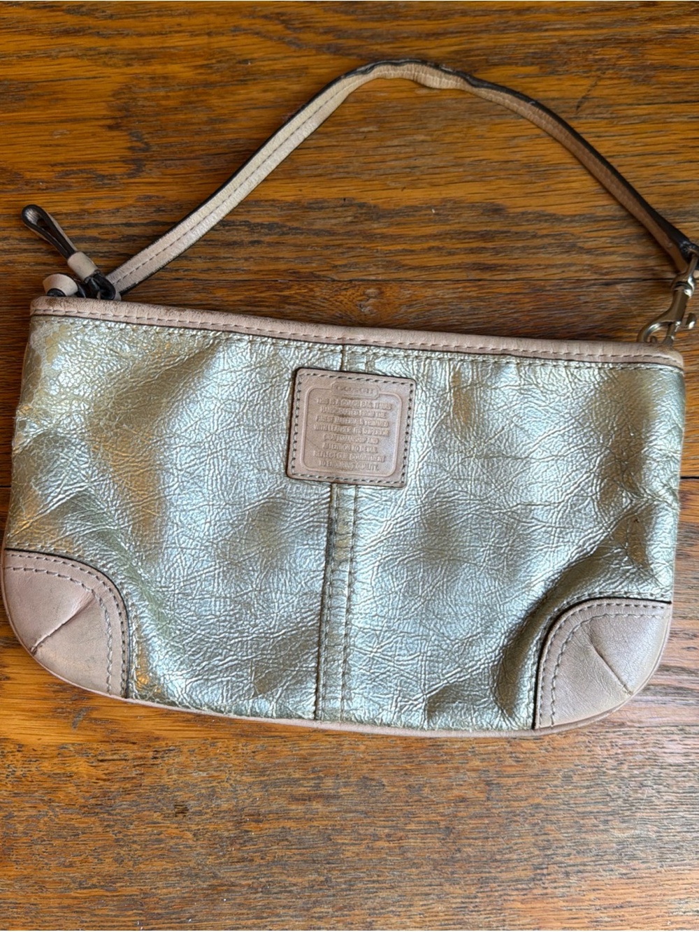 Coach 50169e Metallic Silver Wristlet Bag Beige Trim Stitching Thrashed